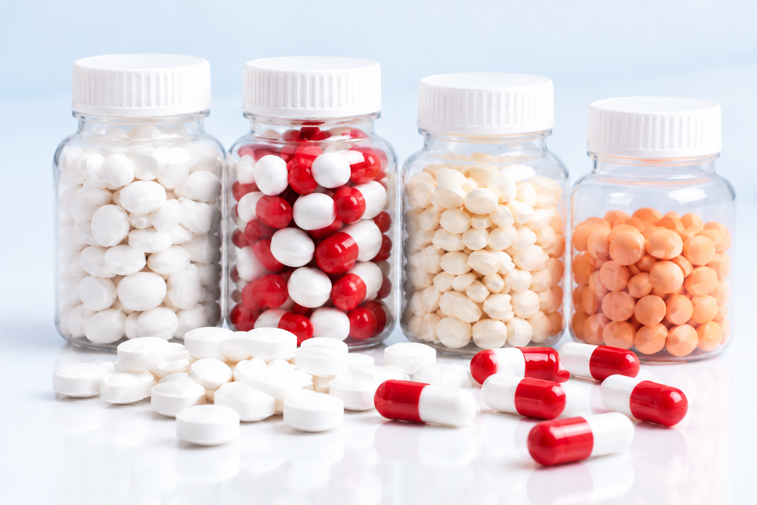 Tablets and red white capsules for automatic counting and bottling